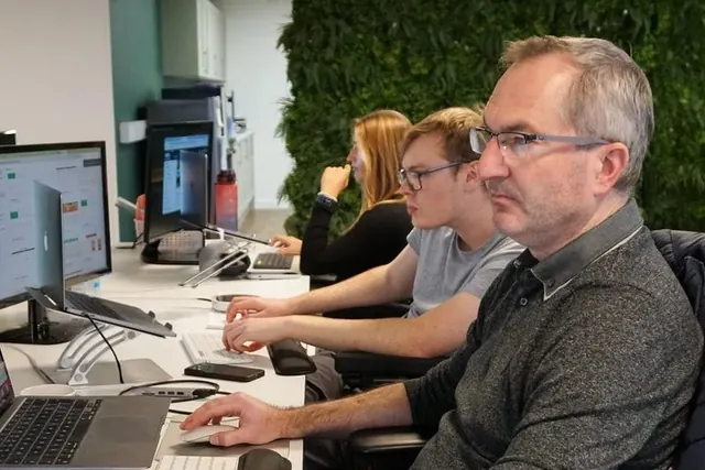 The Kabinly team reviewing campaigns together